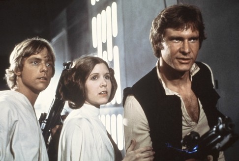Mark Hamill (left), Carrie Fisher and Harrison Ford in the first Star Wars film.