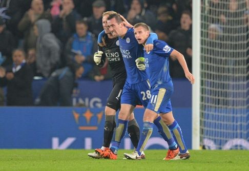 Leicester City's Kasper Schmeichel, Christian Fuchs and Marc Albrighton celebrate. Photo: AFP