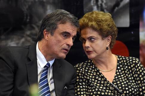 Brazilian President Dilma Rousseff (right) is facing impeachment proceedings. She is pictured with her Minister of Justice Jose Eduardo Cardozo in Brasilia on Tuesday. Photo: AFP