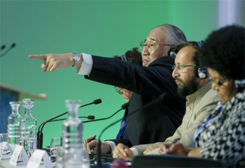 Xie Zhenhua, China's special representative on climate change, takes questions from the press at the Paris summit. He called the climate deal “fair and just”. Photo: Xinhua