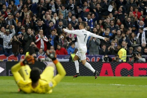 Ronaldo celebrates after scoring his second goal. Photo: AP