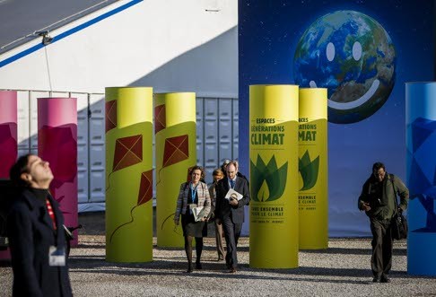 Participants walk through the venue for the Paris Climate Change Conference in Le Bourget, Paris, last month. The Paris accord has brought forth a new era of environmental movements. Photo: Xinhua