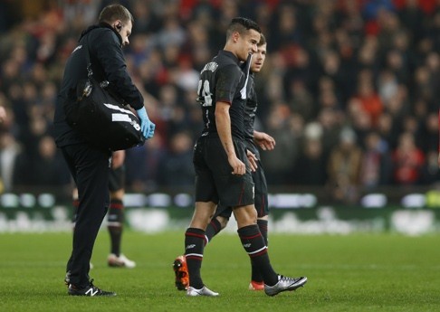 Philippe Coutinho is substituted after sustaining an hamstring injury. Photo: Reuters