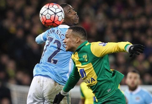 Manchester City's Nigerian striker Kelechi Iheanacho (L ) vies with Norwich City's Swedish defender Martin Olsson. Photo: AFP