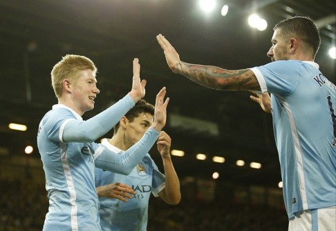 Kevin De Bruyne celebrates scoring the third goal for Manchester City. Photo: Reuters