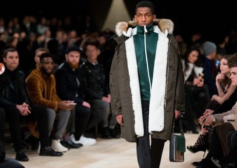 A model takes to the catwalk presenting a creation by Burberry during London Men's Fashion Week. Photo: EPA