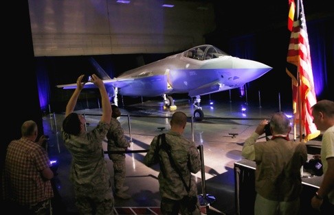 Members of the US Air Force and spectators get photographs of the first F-35 delivered to Luke Air Force Base in Glendale, Arizona in 2014. Photo: AP