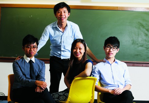 (From left Francis Lau, Arnold Chan, Cherry Chan and Jacky Lo from Teach4HK at Tsuen Wan Trade Association Primary School.