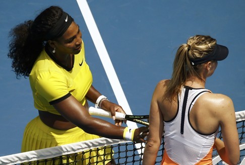 See you later: Serena Williams touches Maria Sharapova’s arm after thumping her once more. Photo: Reuters