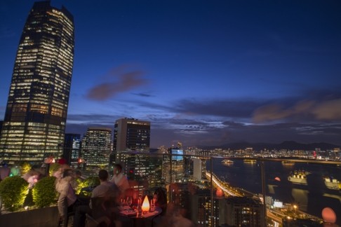 The view from Sugar, a high-floor bar in Taikoo Shing. Nearby Sai Wan Ho has seen an increase in property searches. Photo: Antony Dickson