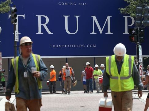Workers at the site of the future Trump International Hotel in Washington. Trump is under fire for saying that drug dealers and rapists cross the border illegally each day into the United States from Mexico. Photo: AFP