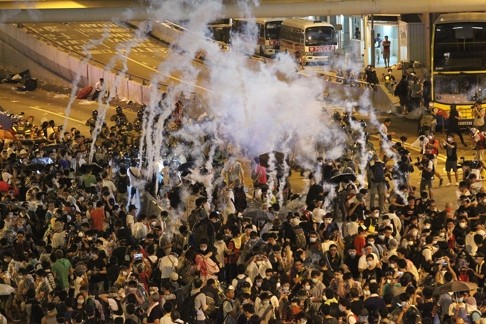 Police fire tear gas at pro-democracy protesters as “Occupy Central