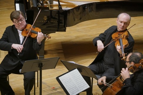 Violinist Martin Beaver, violist Paul Neubauer and cellist Gary Hoffman.