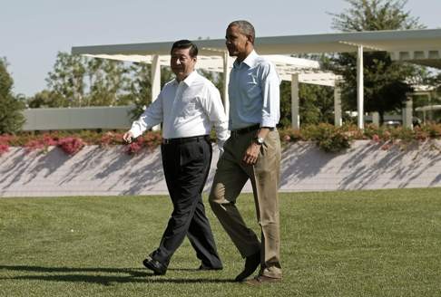 President Xi Jinping and US President Barack Obama take a casual stroll for the media at Sunnylands estate in June, 2013. Photo: Reuters