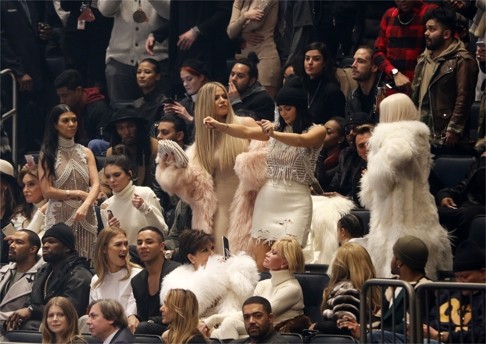 Second row from left: Caitlyn Jenner, Kourtney Kardashian, Kendall Jenner, Khloe Kardashian, Kylie Jenner and Kim Kardashian. Photo: AP