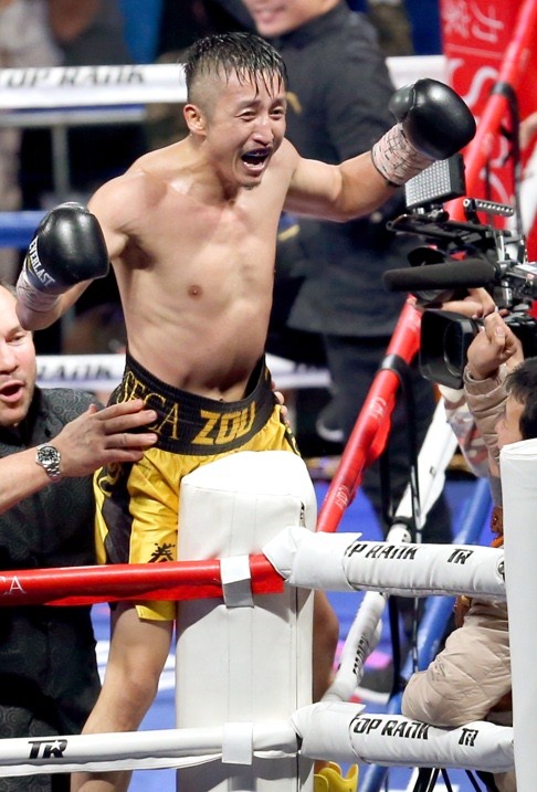 Zou Shiming is hoping to earn another world title shot this year with his latest win in Shanghai putting him back to winning ways. Photo: Xinhua