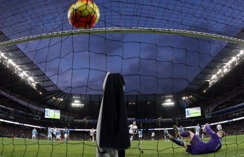 Harry Kane converts for the opener in Spurs’ 2-1 win. Photo: AP