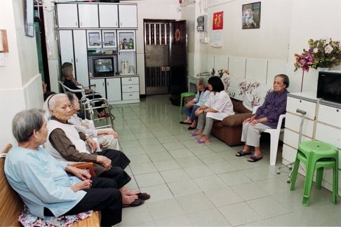 At Foo Yan Home, a private care centre for the elderly in North Point, just four staff look after 30 elderly people. It is one of many private centres in Hong Kong which is unable to provide enough carers, nurses or therapists for the elderly. Photo: SCMP
