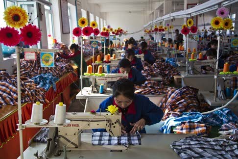 North Korean seamstresses at work in the Sonbong textile factory in the Rason special economic zone. Photo: AP