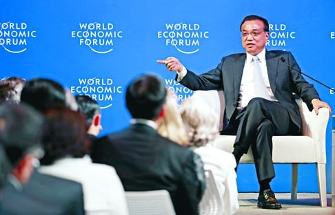 China's Premier Li Keqiang takes the stage at the World Economic Forum (WEF) in China's port city Dalian, in September 2015. Photo: Reuters