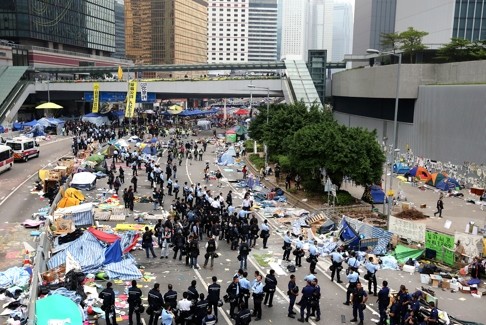 Police clear the main base for Occupy protesters in Admiralty in December, 2014. Photo: Felix Wong