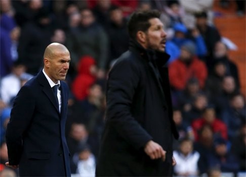 Real Madrid manager Zinedine Zidane said the league title was likely beyond his team’s reach after their derby defeat to Atletico Madrid. Photo: Reuters