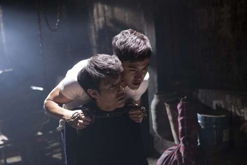 Zhang Chao and Ruan in a scene from the murder mystery.