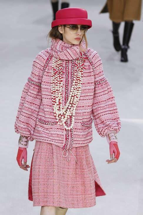 Overlapping layers of pearls complemented classic Chanel tweeds. Photo: AFP