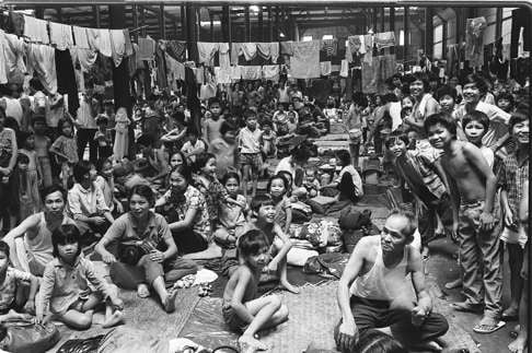 Vietnamese refugees waiting at the Hong Kong Government Dockyard for the British vessel Sibonga to carry them to Britain. Photo: SCMP Pictures