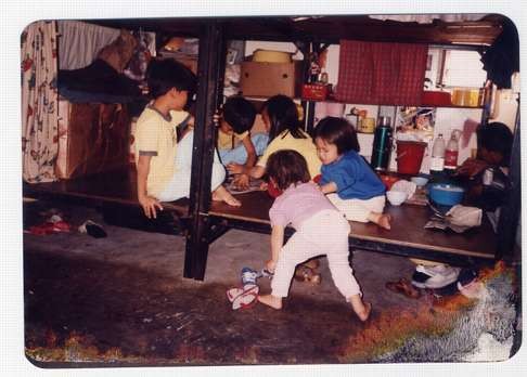 Vietnamese children playing at a detention centre in Hong Kong in the 1990s.