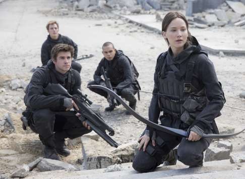 Liam Hemsworth (left) and Jennifer Lawrence in The Hunger Games: Mockingjay – Part 2.