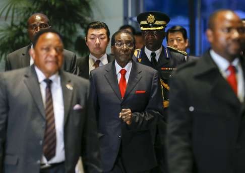Robert Mugabe arriving at the Japanese Prime Minister's official residence. Photo: EPA