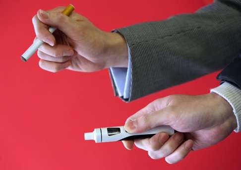 A disposable e-cigarette (above) and a rechargeable one, both displayed by the Asian Vape Association. Photo: Nora Tam