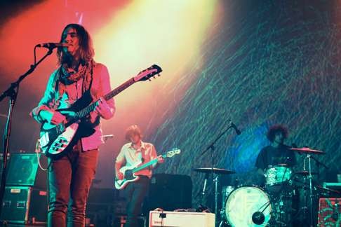 Kevin Parker rocking out live with Tame Impala bandmates.