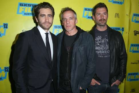 From left: Jake Gyllenhaal, Jean-Marc Vallée and Bryan Sipe arrive for a screening of Demolition during the South By Southwest festival in Austin, Texas, in March. Photo: AP