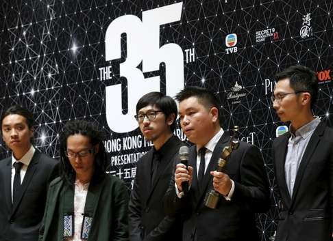 Cast members, directors and Ten Years executive producer Andrew Choi (second right) backstage at the Hong Kong Film Awards on April 3. Photo: Reuters