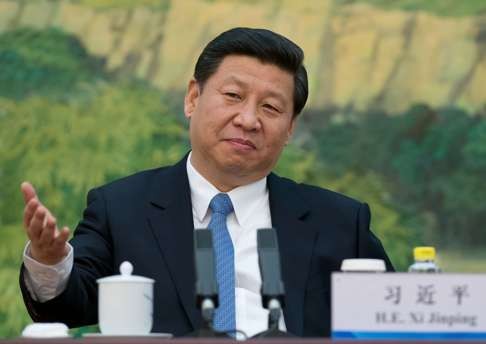 Xi Jinping attends a meeting at the Great Hall of the People in Beijing. Photo: AFP