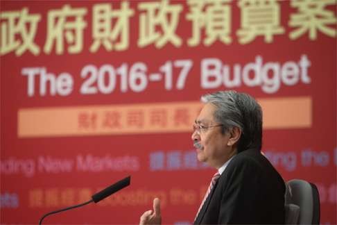 Financial secretary John Tsang speaks about his 2016 budget on a radio programme. Photo: Sam Tsang