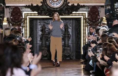 Stella McCartney acknowledges the audience at the autumn-winter 2016 ready-to-wear show in Paris. Photo: AFP