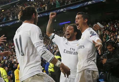 Ronaldo celebrates with Marcelo and Gareth Bale. Photo: Reuters