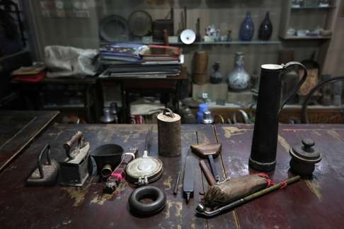 Household items and street objects dating from the 1900s to 1970s collected by Wang Jinming are displayed at his private museum in Beijing.