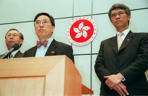 Rafael Hui, Secretary for Financial Services, Donald Tsang, Financial Secretary and Joseph Yam, HKMA Director meet the media on the new economic policy on August 14, 2008. Photo: Dustin Shum