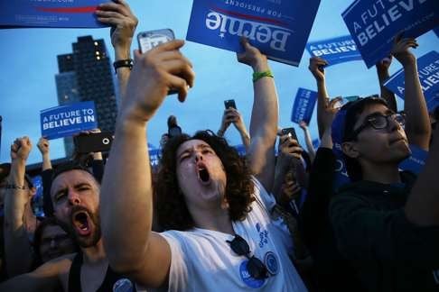 Supporters of Democratic presidential candidate Bernie Sanders cheer him at a rally in New York. The ongoing campaigns in the US presidential election suggests that trade protectionism will dominate the US economic agenda in the years to come. Photo: AFP