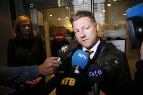 Norway's Attorney General, Marius Emberland, gives a statement outside his office in Oslo on Wednesday, after a court ruled that the human rights of mass murderer Anders Behring Breivik had been violated. Photo: EPA