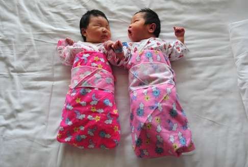 A file photo showing newborn babies on a hospital bed in Beijing. China announced the end of its hugely controversial one-child policy on October 29, 2015. Photo: AFP