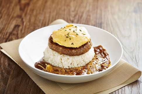 Japanese black curry beefburger with cheese and scrambled egg.
