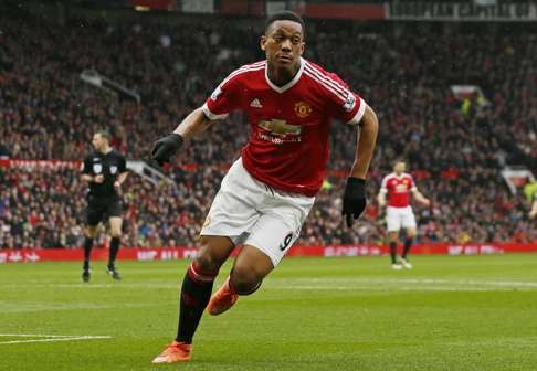 Anthony Martial sets off on a celebration run after scoring the opener for Manchester United against Leicester City. Photo: Reuters