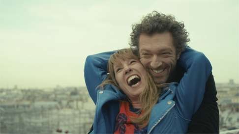 Cassel and Emmanuelle Bercot share a light moment in Mon Roi.