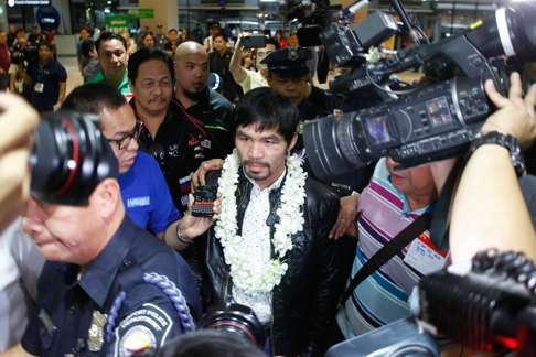 Pacquiao returned from a year out injured to win his final bout earlier this year. Photo: EPA