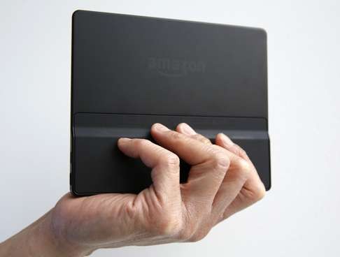 The Kindle Oasis has a grip to make it easy to hold with one hand. Photo: AP